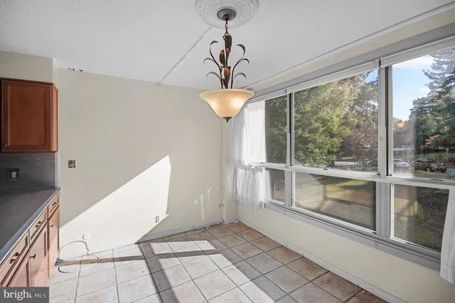 a bathroom with a shower and toilet