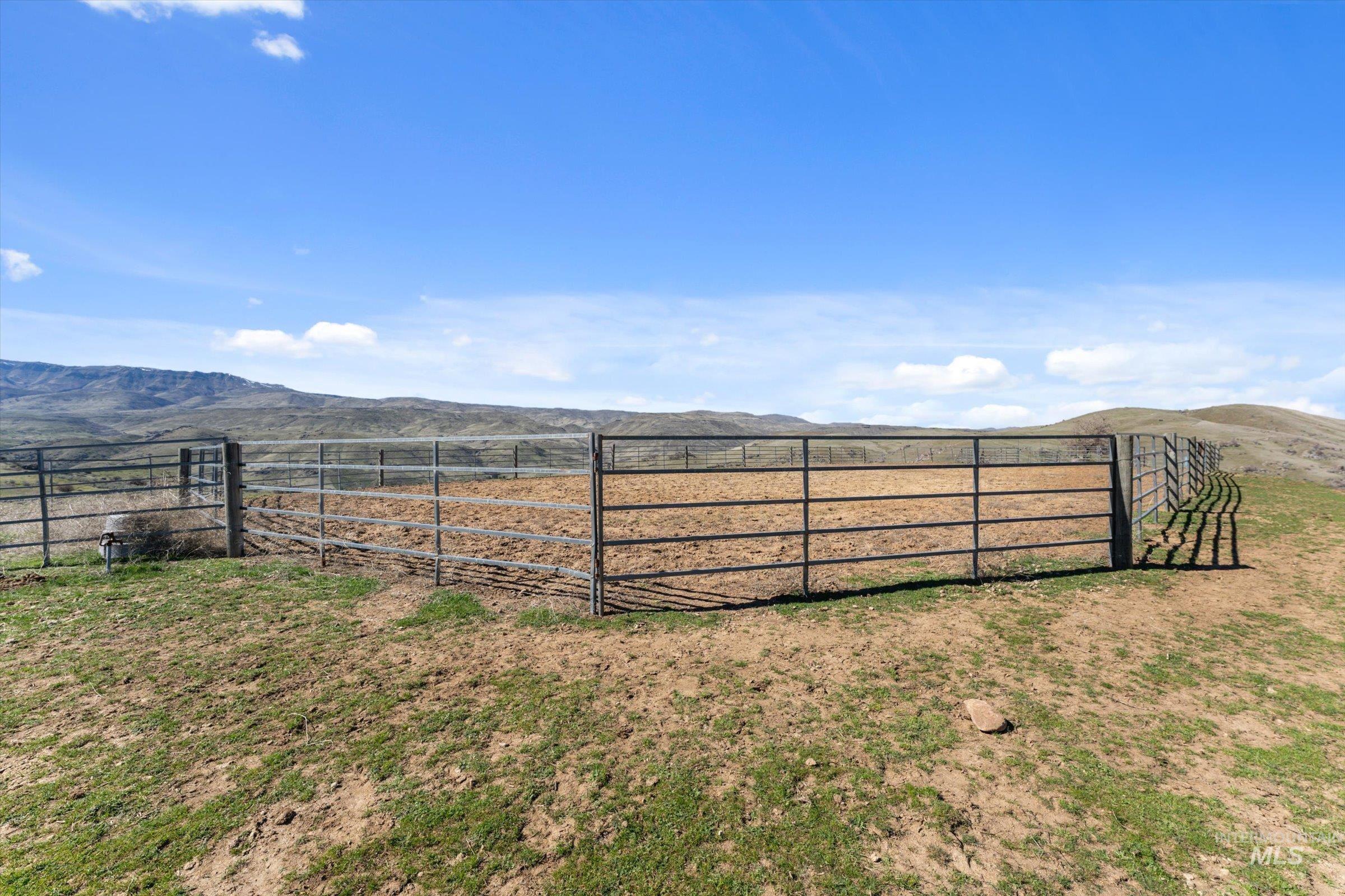 11555 Liberty Road Sweet, ID 83670 - Photo 1 of 49 View of yard featuring a mountain view, a view of rural / pastoral area, and an outdoor riding arena