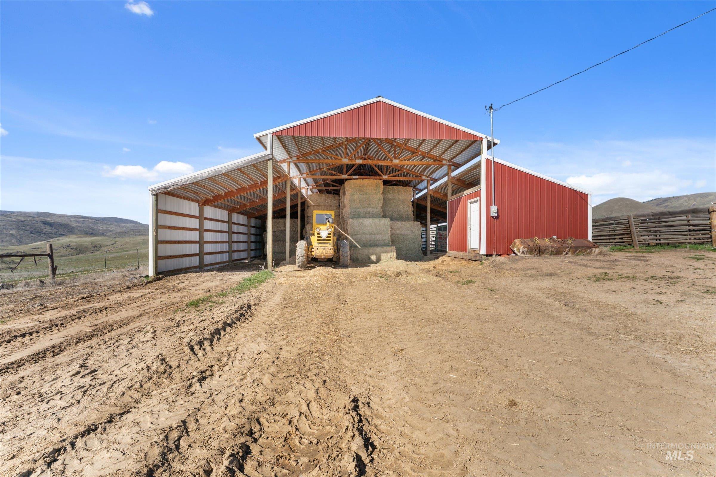 11555 Liberty Road Sweet, ID 83670 - Photo 8 of 49 View of outbuilding featuring a mountain view, a view of rural / pastoral area, and a carport