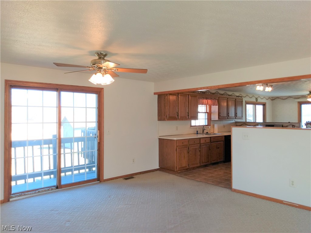 9643 Tallmadge Road Diamond, OH 44412 - Photo 13 of 35 This area off the kitchen could also be flexible space. It adjoins to the formal living area and could be either a huge living room or formal dining room off the living room....you decide!
