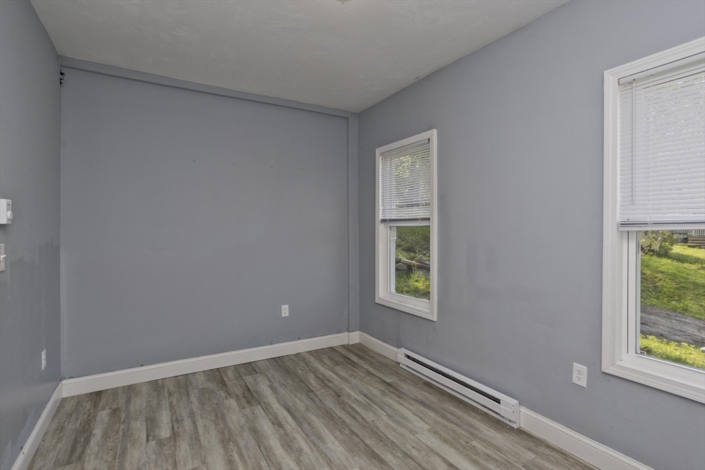107 Eastern Avenue Worcester, MA 01605 - Photo 30 of 38 an empty room with windows
