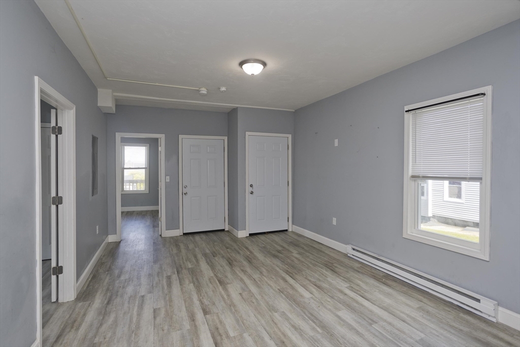 107 Eastern Avenue Worcester, MA 01605 - Photo 35 of 38 a view of entryway with wooden floor