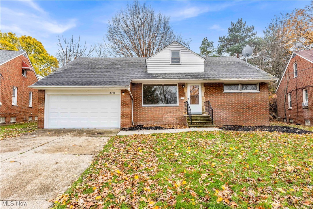 19720 Upper Terrace Road Euclid, OH 44117 - Photo 1 of 31 View of front of house featuring a front yard and a garage