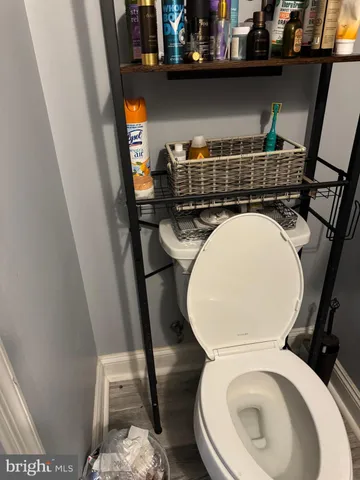 a close view of a utility room with washer and dryer