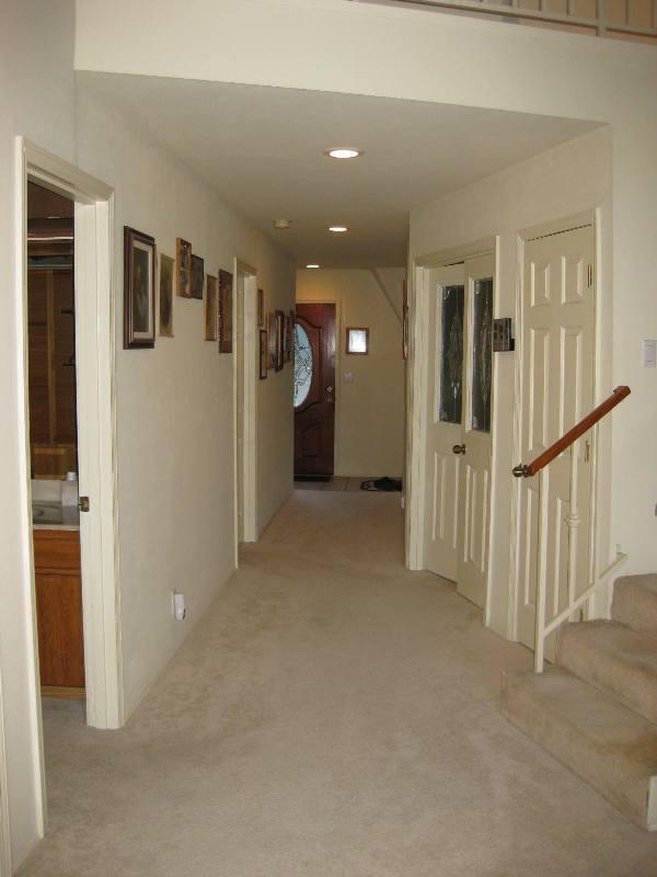 2363 Old Ferry Road Shady Cove, OR 97539 - Photo 10 of 31 a view of a hallway with wooden floor and entryway