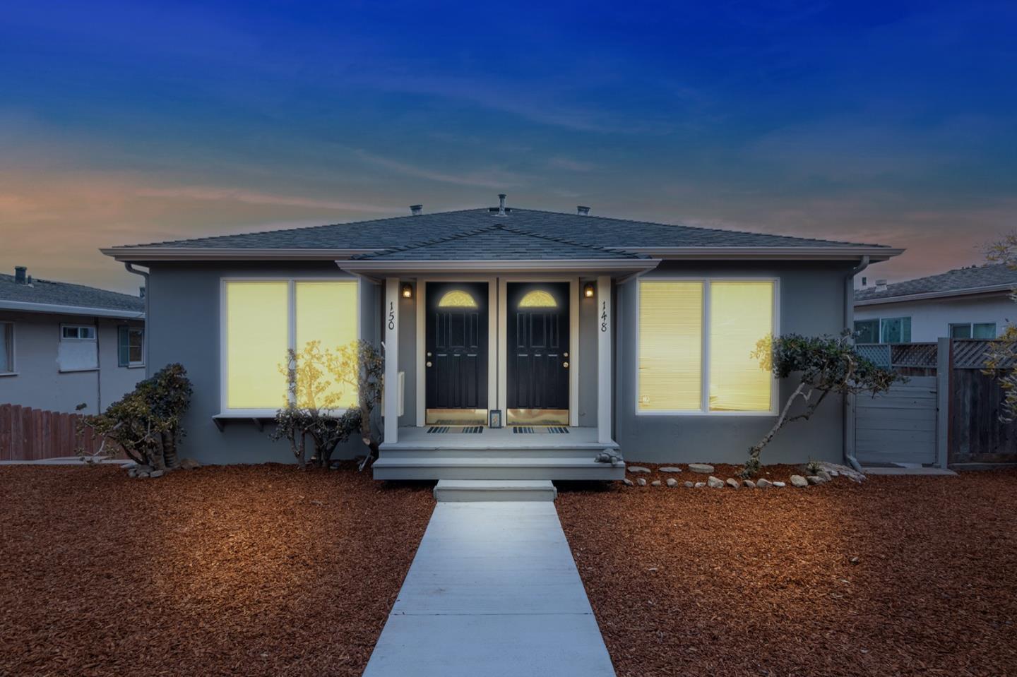 150 Lighthouse Avenue Pacific Grove, CA 93950 - Photo 1 of 1 a front view of a house with a yard
