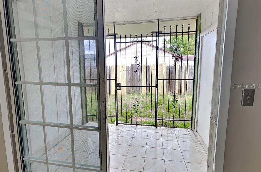 1921 Truman Road Orlando, FL 32807 - Photo 17 of 19 a view of a glass door