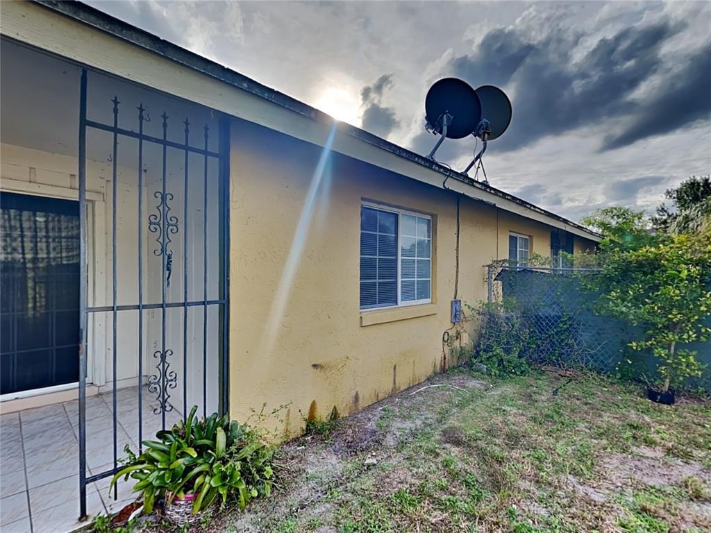 1921 Truman Road Orlando, FL 32807 - Photo 19 of 19 a view of a backyard