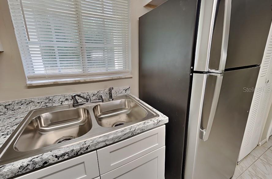 1921 Truman Road Orlando, FL 32807 - Photo 4 of 19 a close view of sink and tap