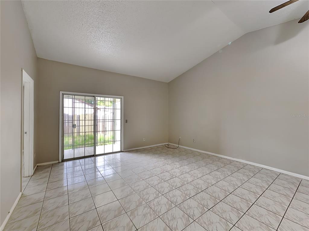 1921 Truman Road Orlando, FL 32807 - Photo 7 of 19 a view of an empty room and window