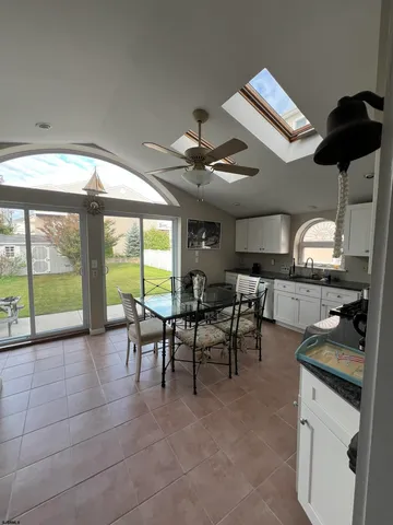 a lobby with furniture and a large window