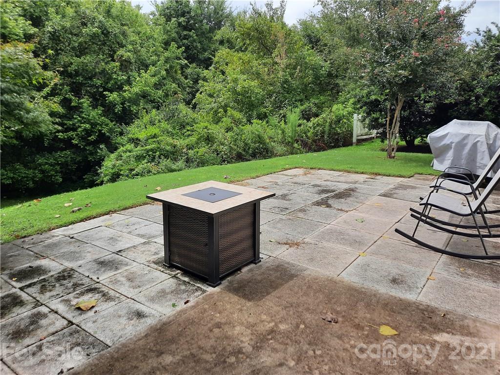 144 Bluffton Road Mooresville, NC 28115 - Photo 3 of 16 a view of a backyard with sitting area