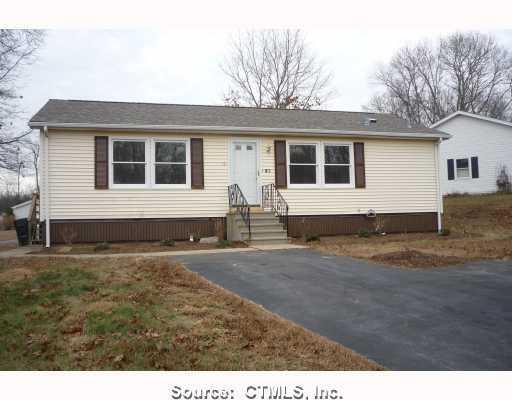 196 Colonial Road Plainfield, CT 06374 - Photo 1 of 1 a front view of a house with yard