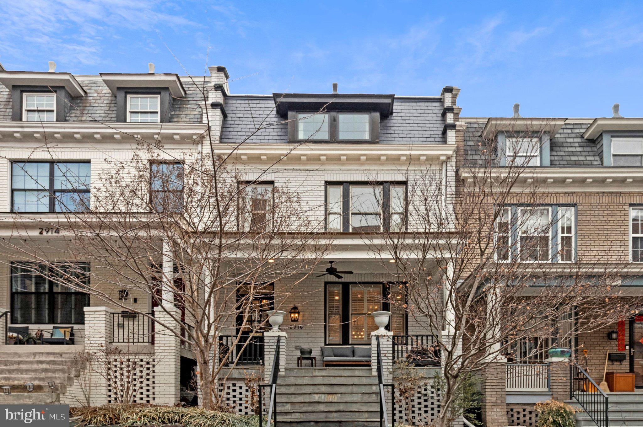 2916 18th Street Northwest Washington, DC 20009 - Photo 1 of 49 a front view of a building with a lot of windows