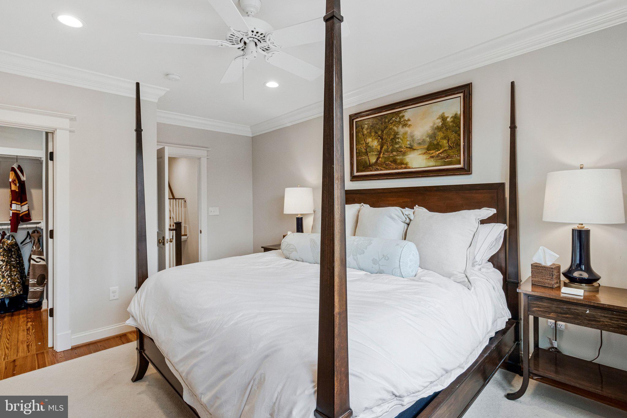2916 18th Street Northwest Washington, DC 20009 - Photo 19 of 49 a bedroom with a bed and a lamp on table