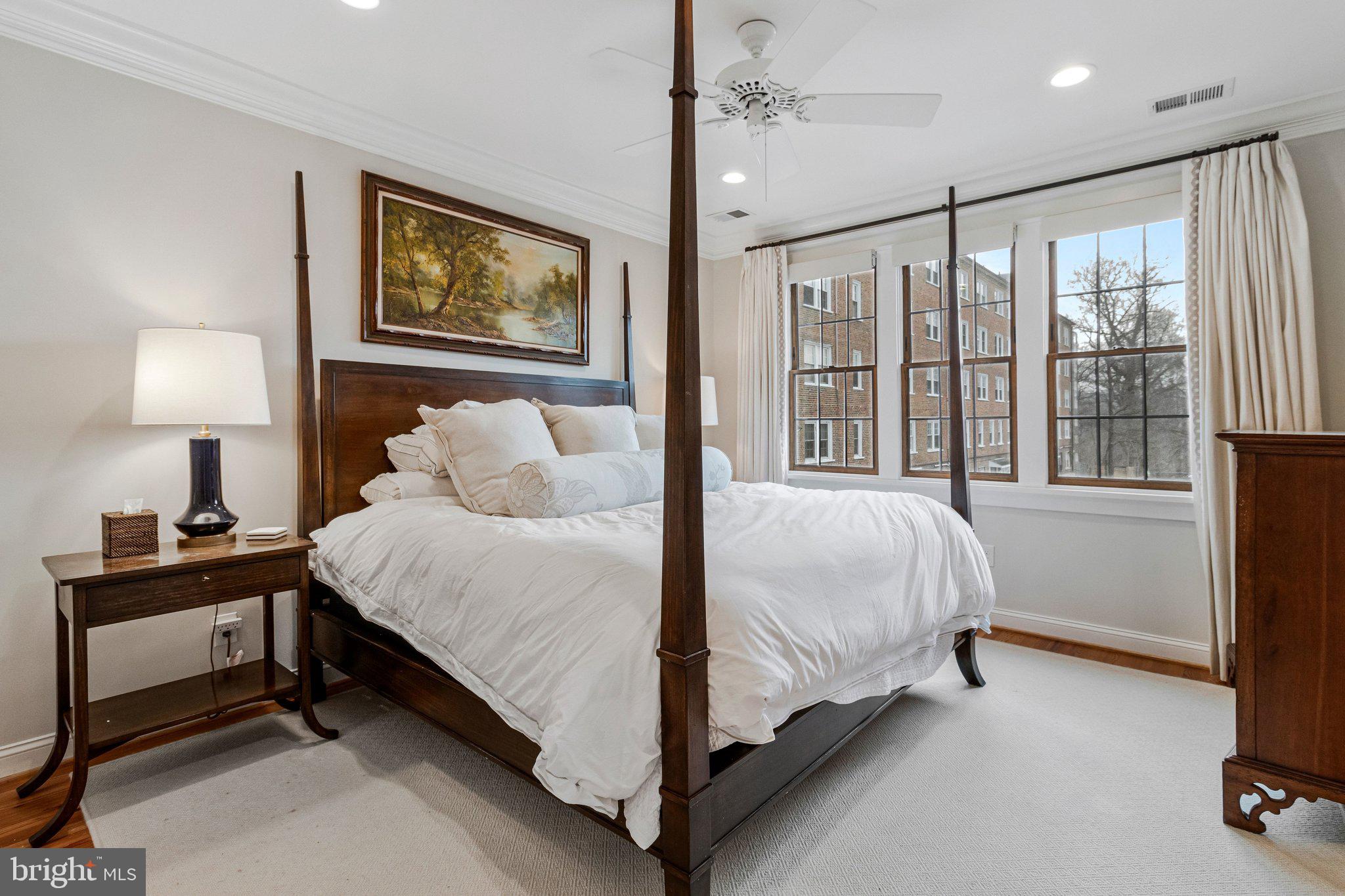 2916 18th Street Northwest Washington, DC 20009 - Photo 20 of 49 a bed room with a bed and a night stand