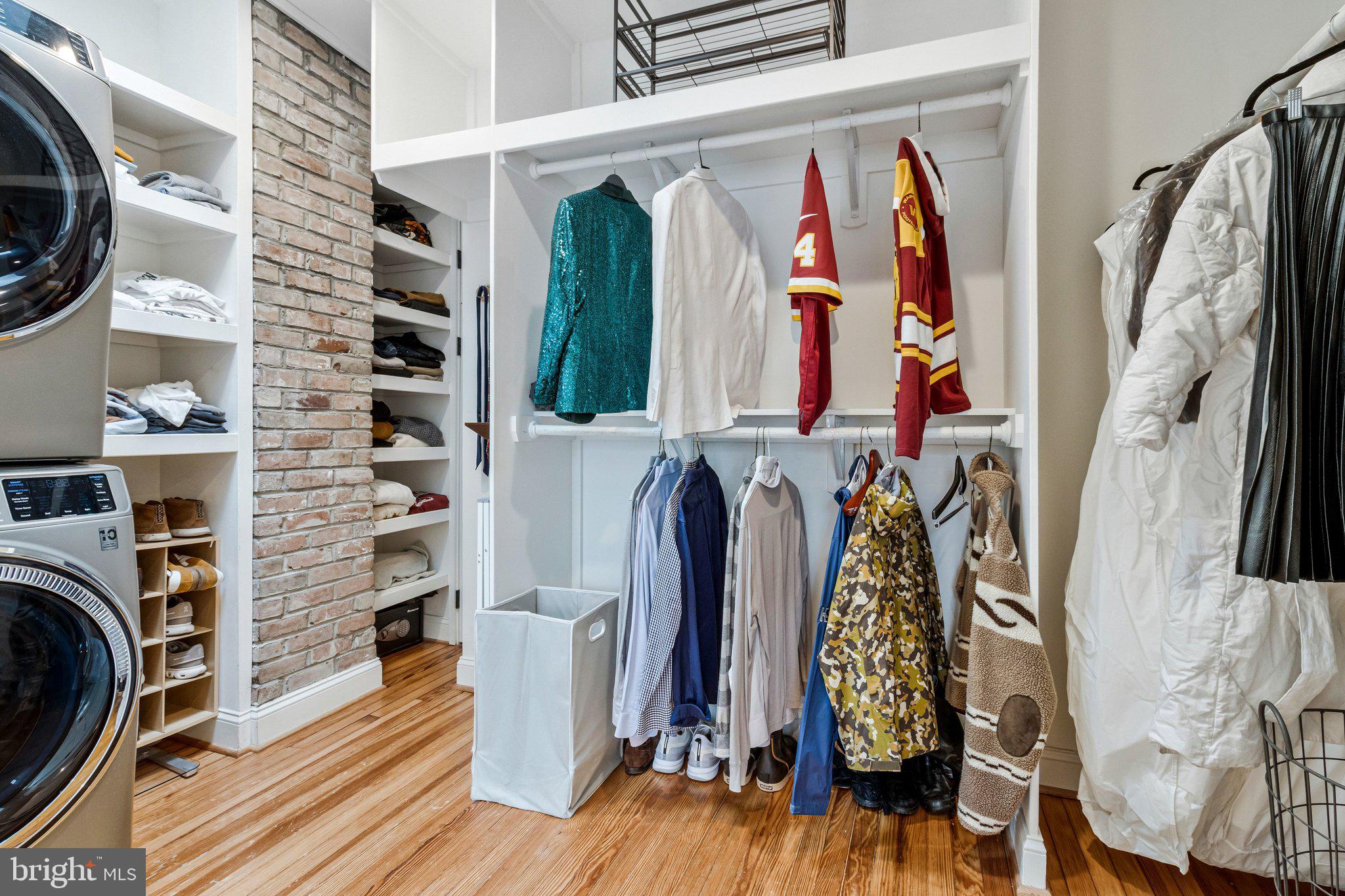 2916 18th Street Northwest Washington, DC 20009 - Photo 27 of 52 a view of walk in closet with clothes and shoes