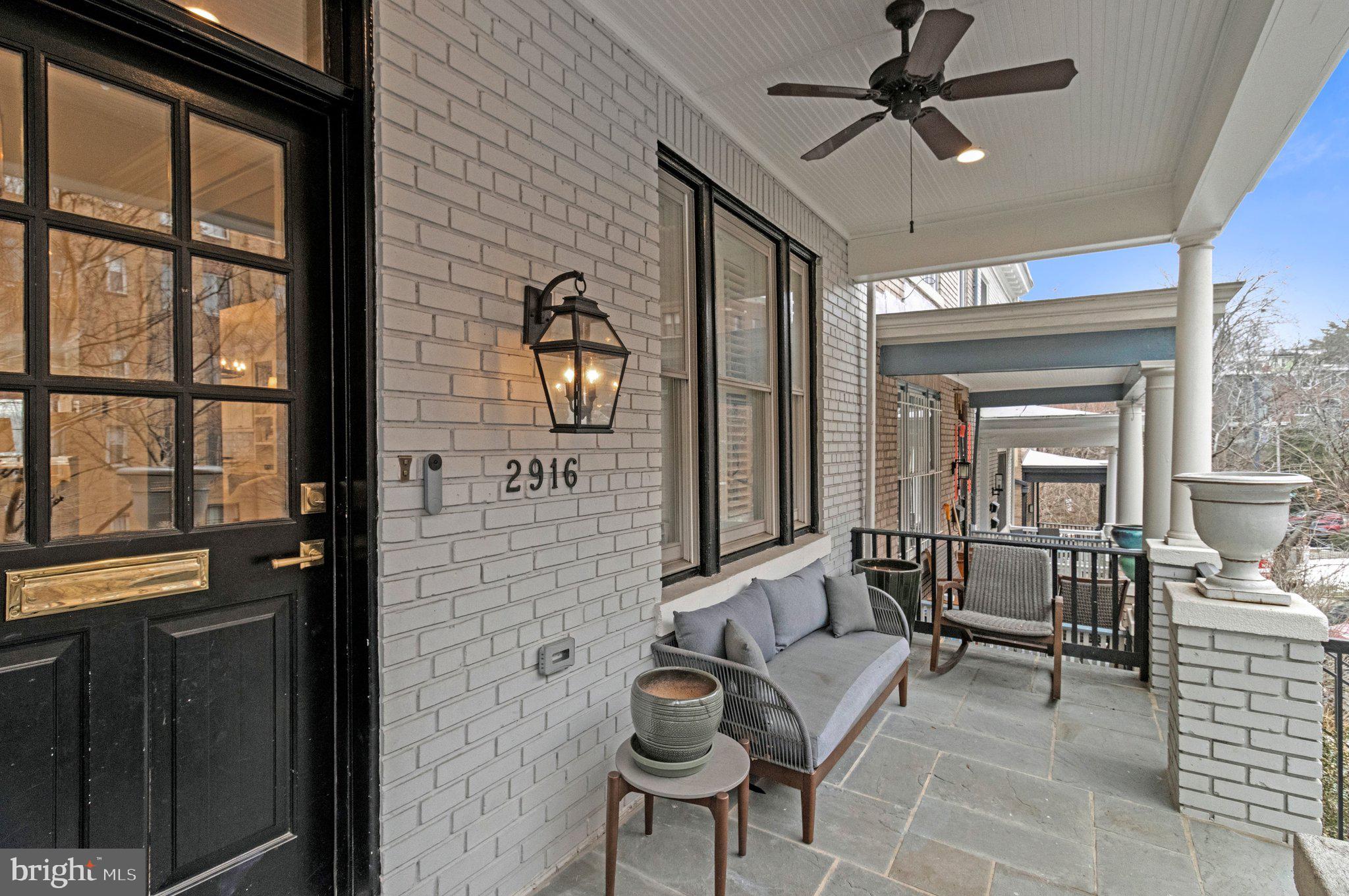 2916 18th Street Northwest Washington, DC 20009 - Photo 45 of 49 a living room with furniture and a large window