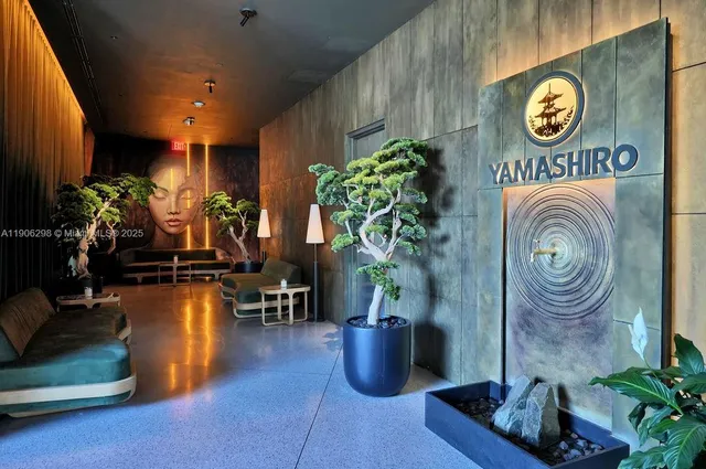 a kitchen with lots of counter space and wooden floor