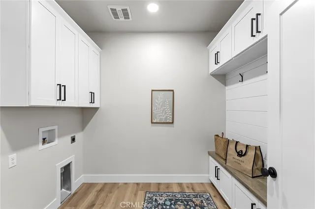 a hallway with storage and utility