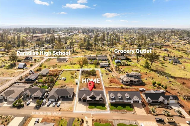 an aerial view of residential building with parking space