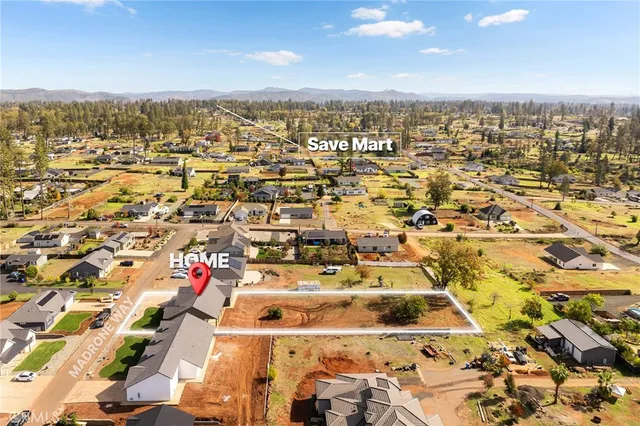 an aerial view of residential building with parking space