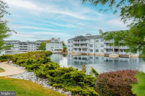 a view of a lake with houses