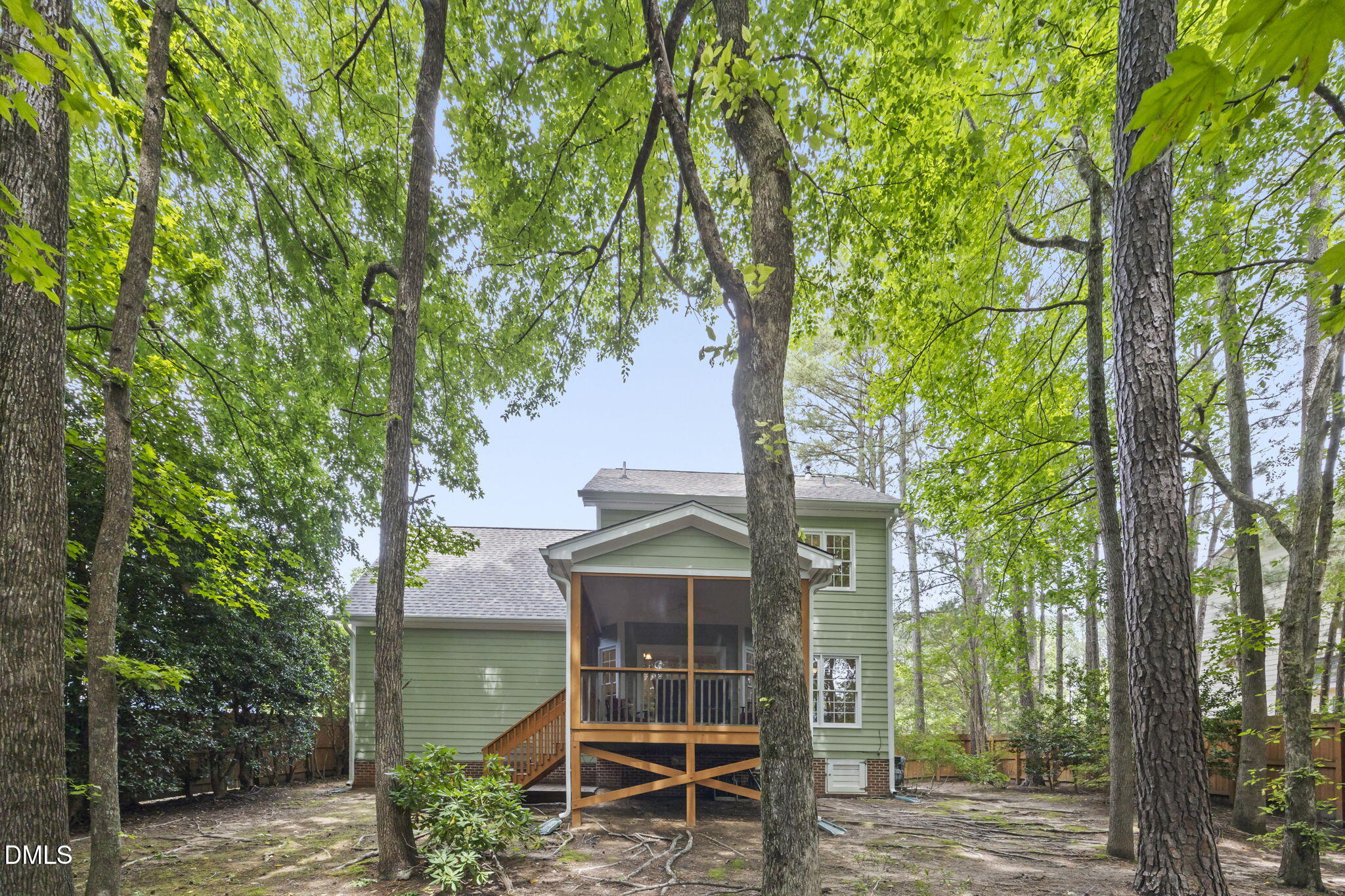 1008 Scotts Ridge Trail Apex, NC 27502 - Photo 7 of 57 a front view of a house with garden