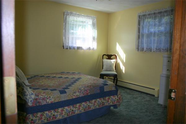 104 Laurel Road Wilbraham, MA 01095 - Photo 13 of 29 a bedroom with a bed and a window
