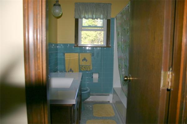104 Laurel Road Wilbraham, MA 01095 - Photo 16 of 29 a bathroom with a sink and a mirror