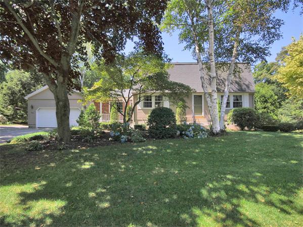 104 Laurel Road Wilbraham, MA 01095 - Photo 2 of 29 a front view of a house with a garden