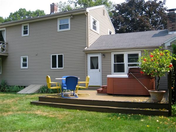 104 Laurel Road Wilbraham, MA 01095 - Photo 21 of 29 a front view of house with yard and outdoor seating