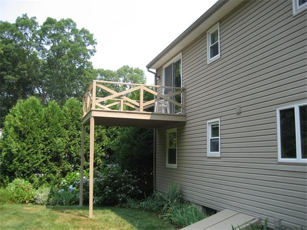 104 Laurel Road Wilbraham, MA 01095 - Photo 27 of 29 a front view of a house with garden