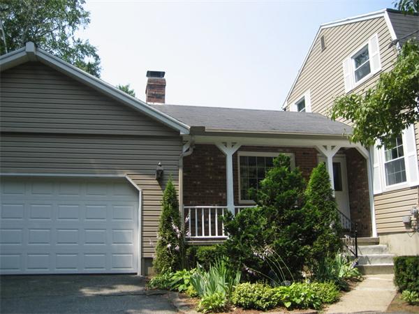 104 Laurel Road Wilbraham, MA 01095 - Photo 28 of 29 a front view of a house with garden