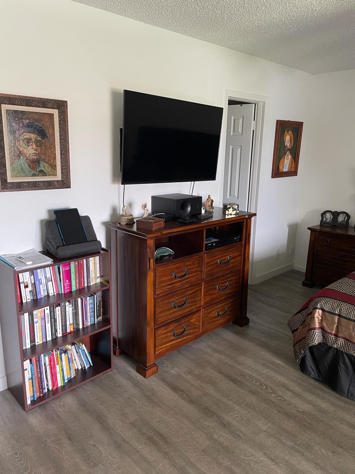 2052 Cornwall C, Unit 2052 Boca Raton, FL 33434 - Photo 15 of 34 a room with furniture and flat screen tv