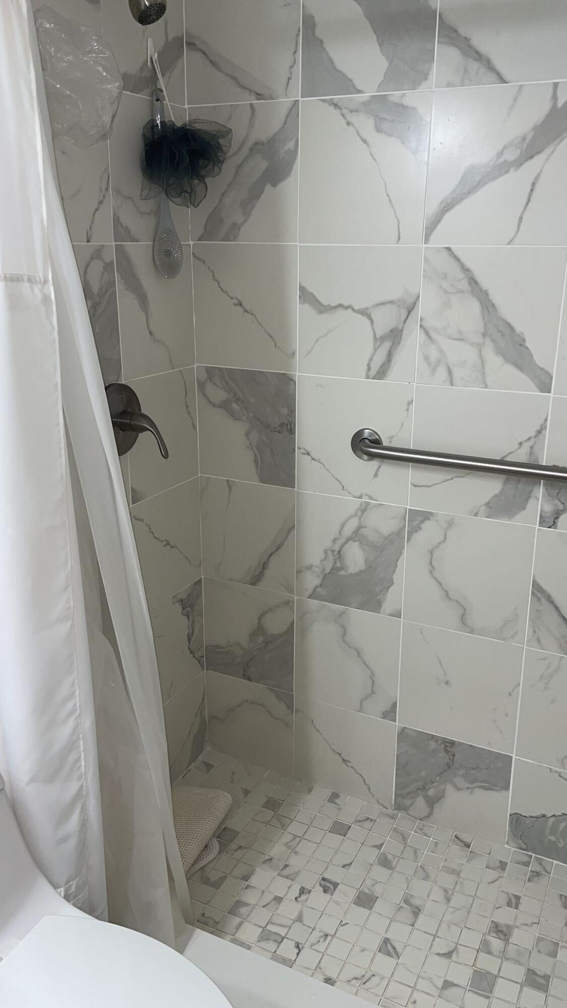 2052 Cornwall C, Unit 2052 Boca Raton, FL 33434 - Photo 18 of 34 a bathroom with a shower