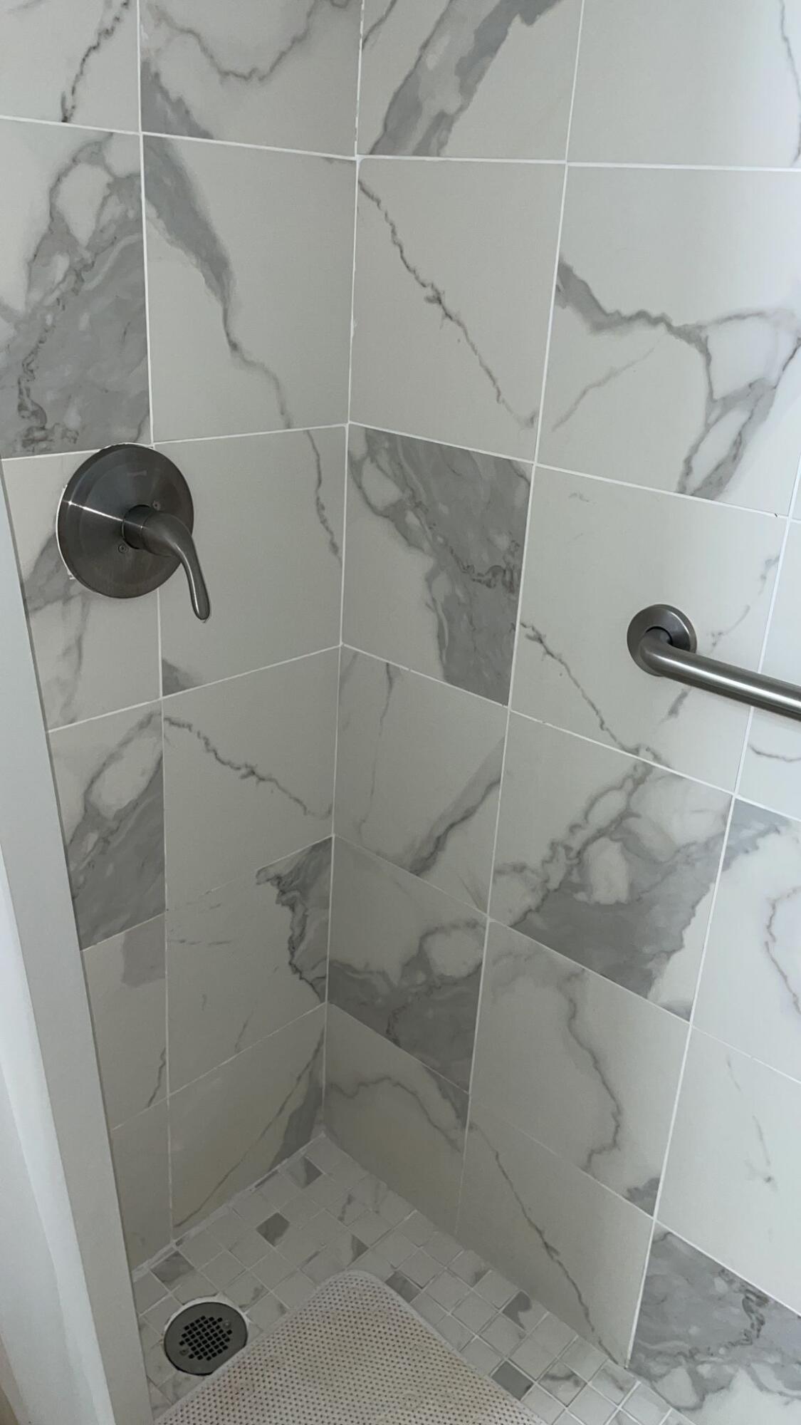 2052 Cornwall C, Unit 2052 Boca Raton, FL 33434 - Photo 20 of 34 a bathroom with a shower