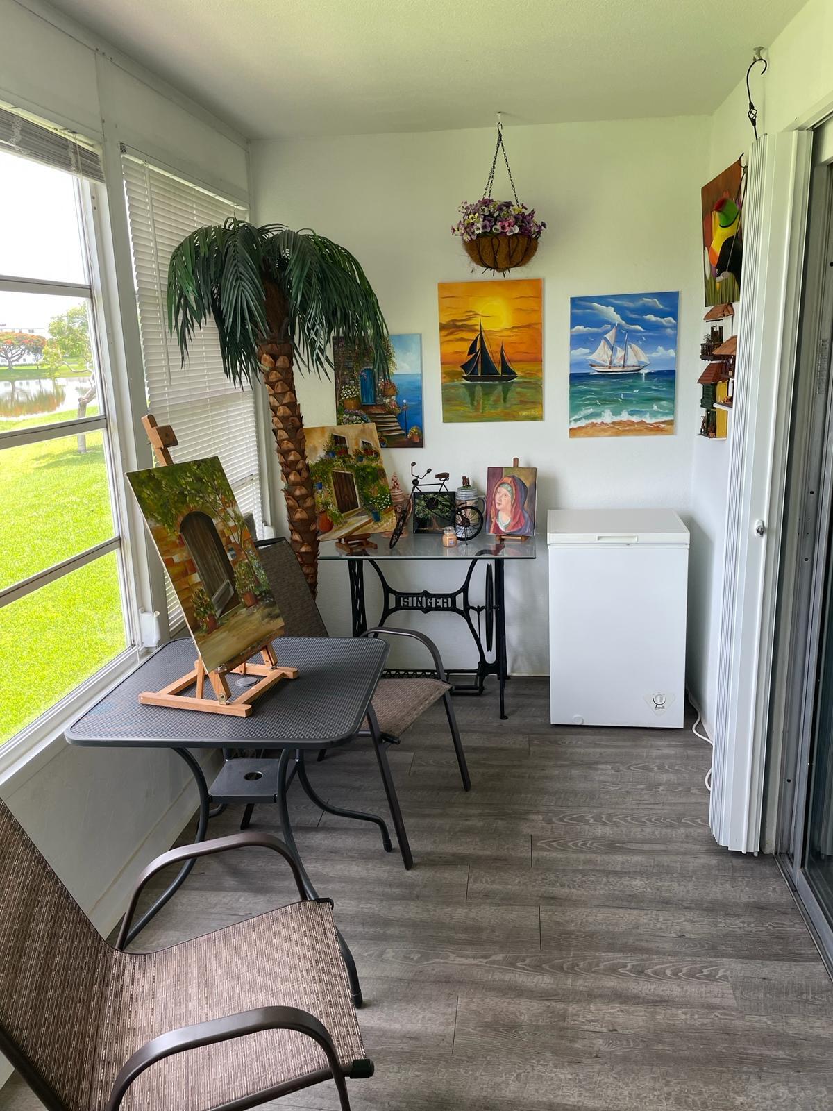 2052 Cornwall C, Unit 2052 Boca Raton, FL 33434 - Photo 25 of 34 a living room with furniture and window
