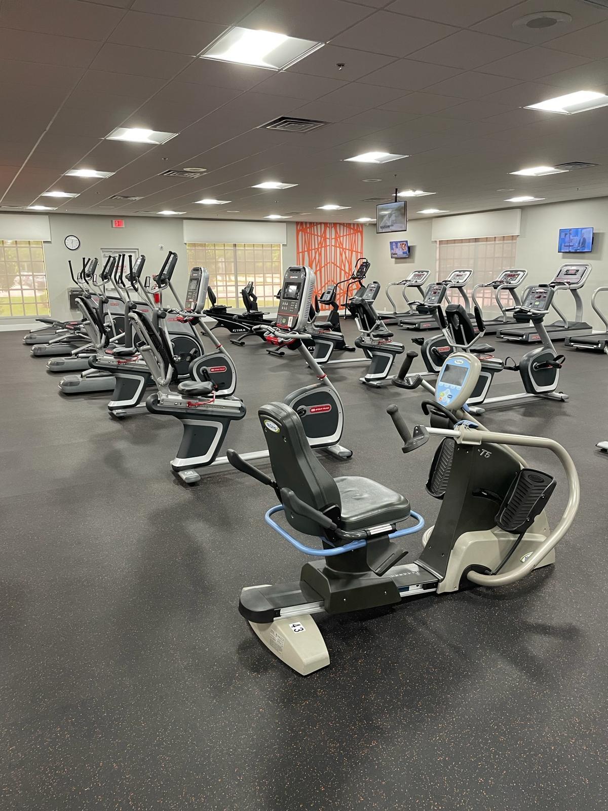 2052 Cornwall C, Unit 2052 Boca Raton, FL 33434 - Photo 28 of 34 a view of a room with gym equipment