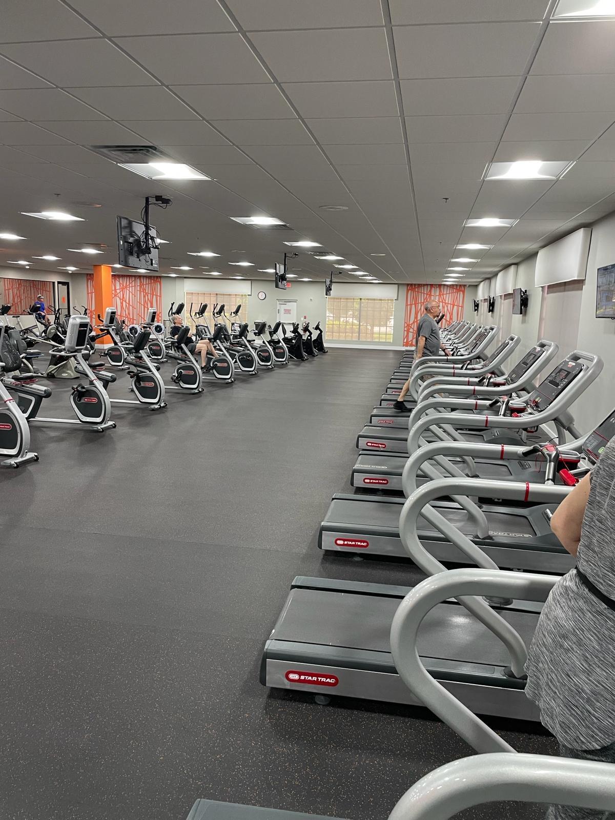 2052 Cornwall C, Unit 2052 Boca Raton, FL 33434 - Photo 29 of 34 a view of a room with gym equipment