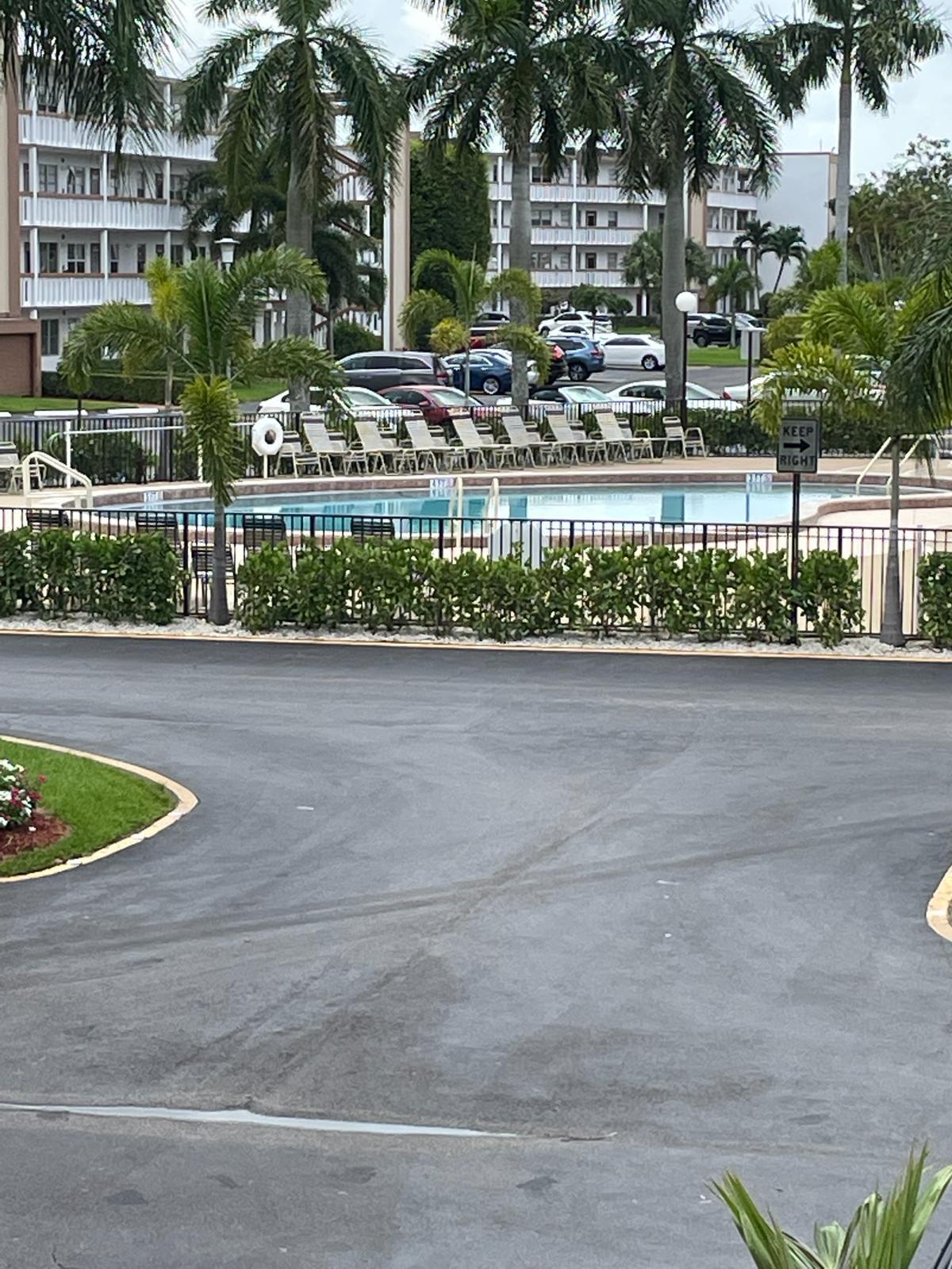 2052 Cornwall C, Unit 2052 Boca Raton, FL 33434 - Photo 30 of 34 a view of outdoor space and yard
