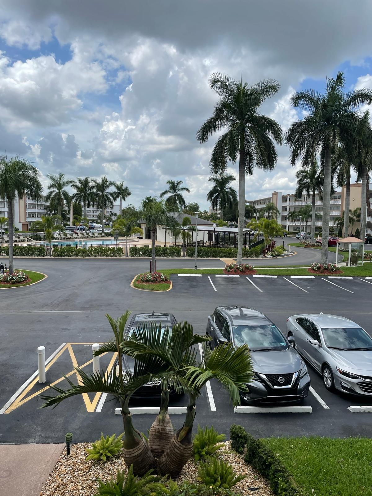 2052 Cornwall C, Unit 2052 Boca Raton, FL 33434 - Photo 31 of 34 a front view of a lake view