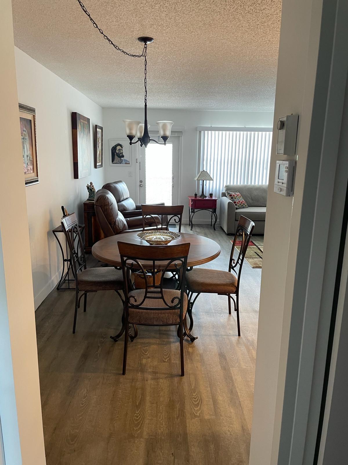 2052 Cornwall C, Unit 2052 Boca Raton, FL 33434 - Photo 9 of 34 a living room with furniture and a window