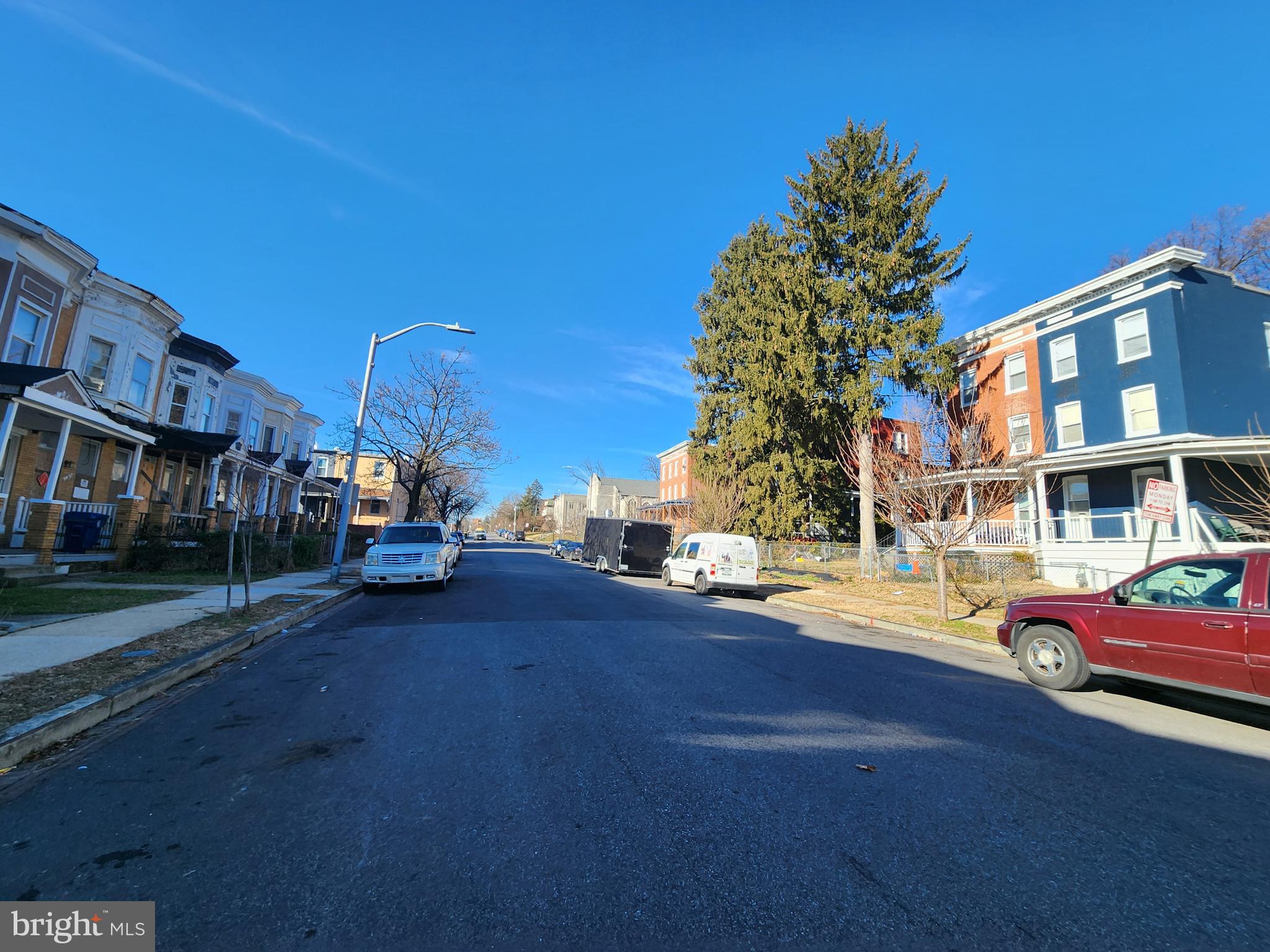 3027 Walbrook Avenue Baltimore, MD 21216 - Photo 19 of 20 a cars parked on the side of a street