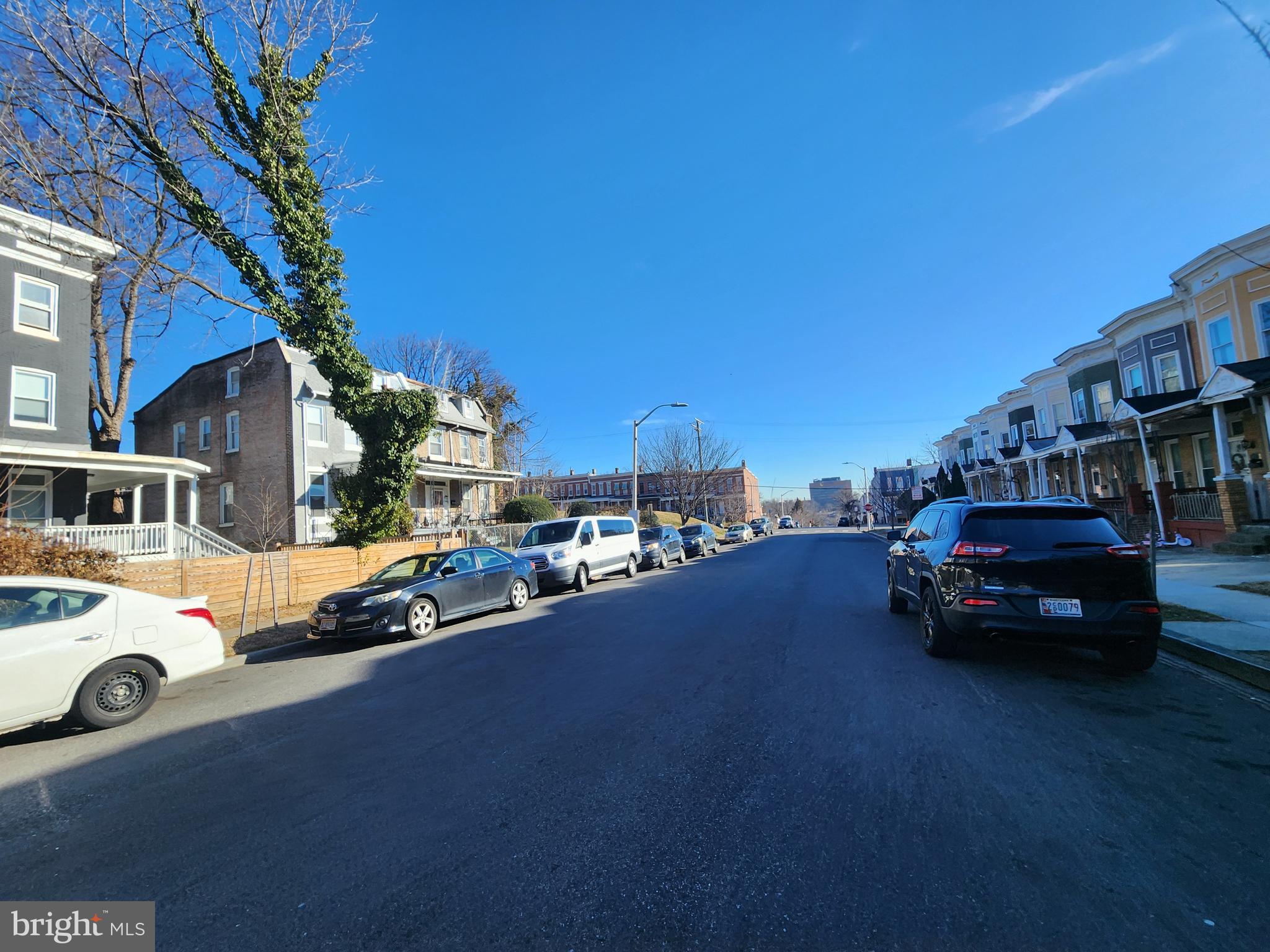3027 Walbrook Avenue Baltimore, MD 21216 - Photo 20 of 20 a car parked in front of a house
