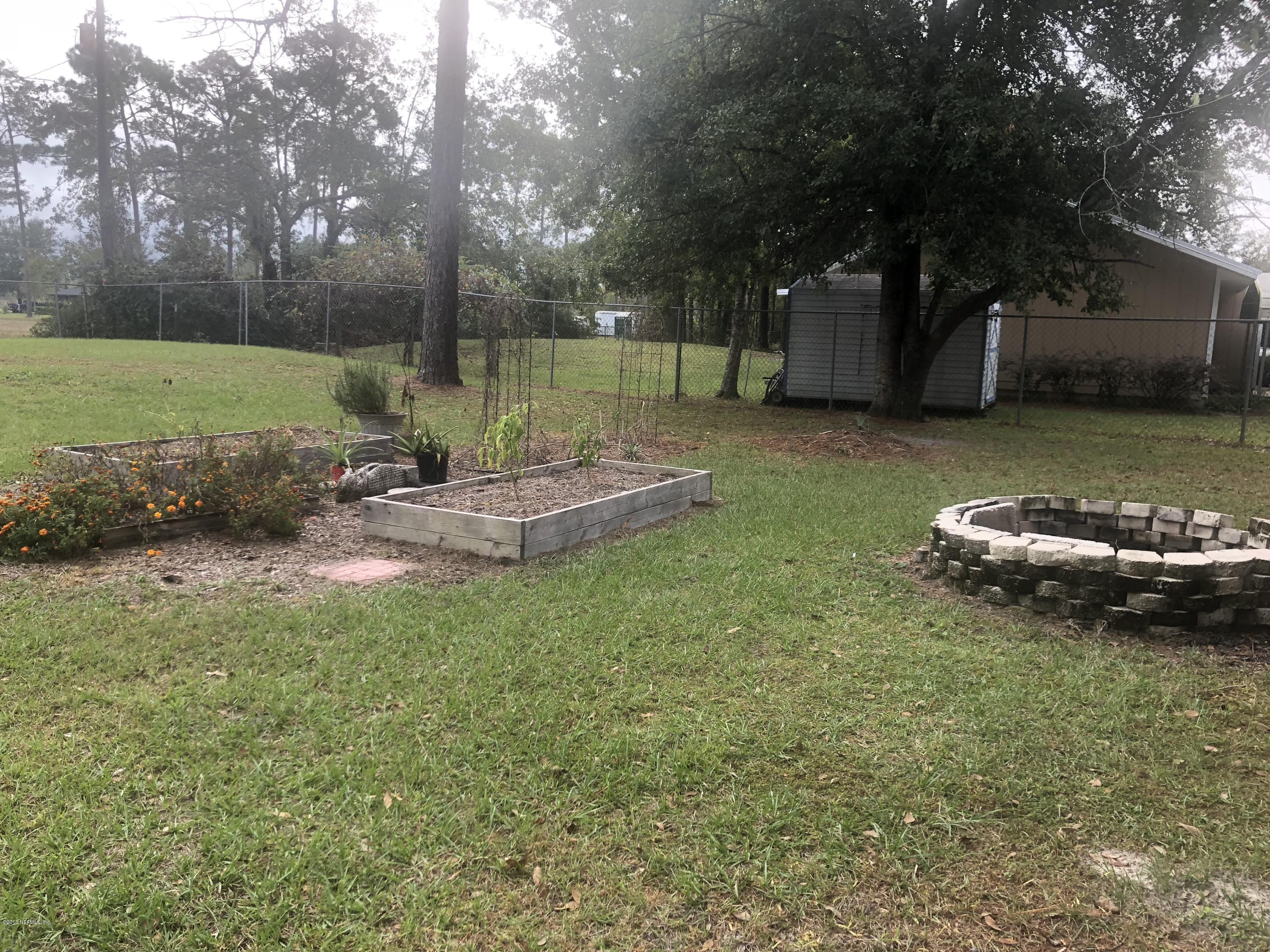 4042 Canal Road Macclenny, FL 32063 - Photo 10 of 23 Garden Beds and Fire Pit