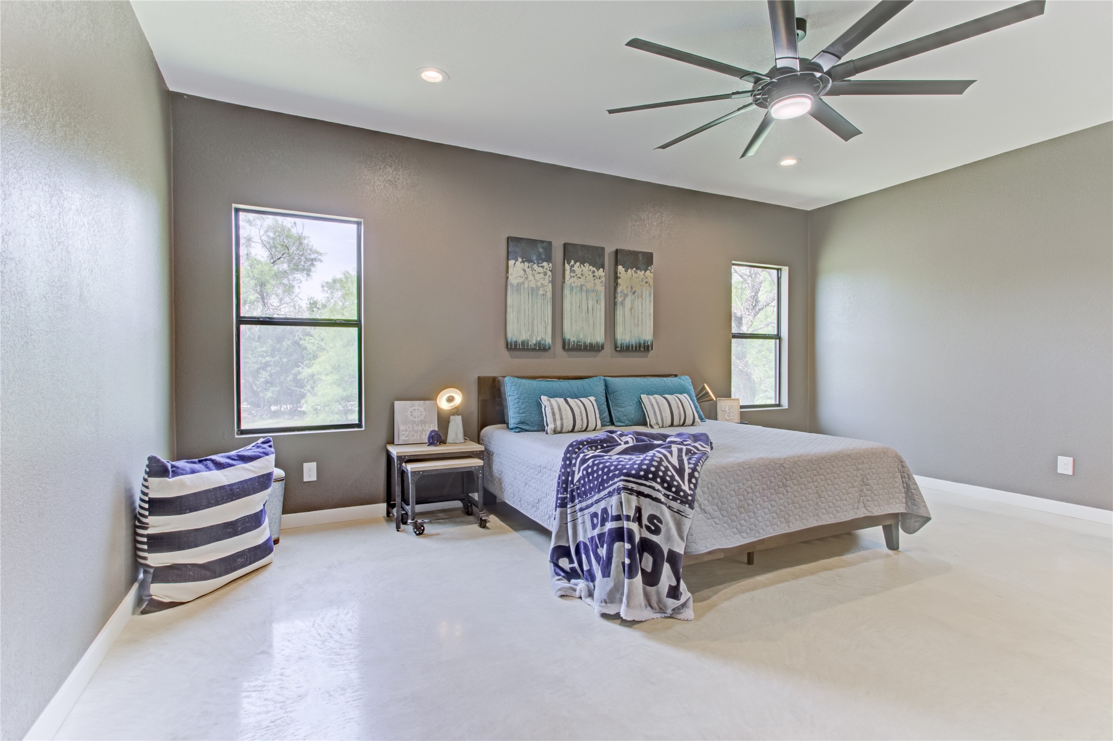 1215 Ridge Harbor Drive Spicewood, TX 78669 - Photo 17 of 39 a bedroom with a bed furniture and window