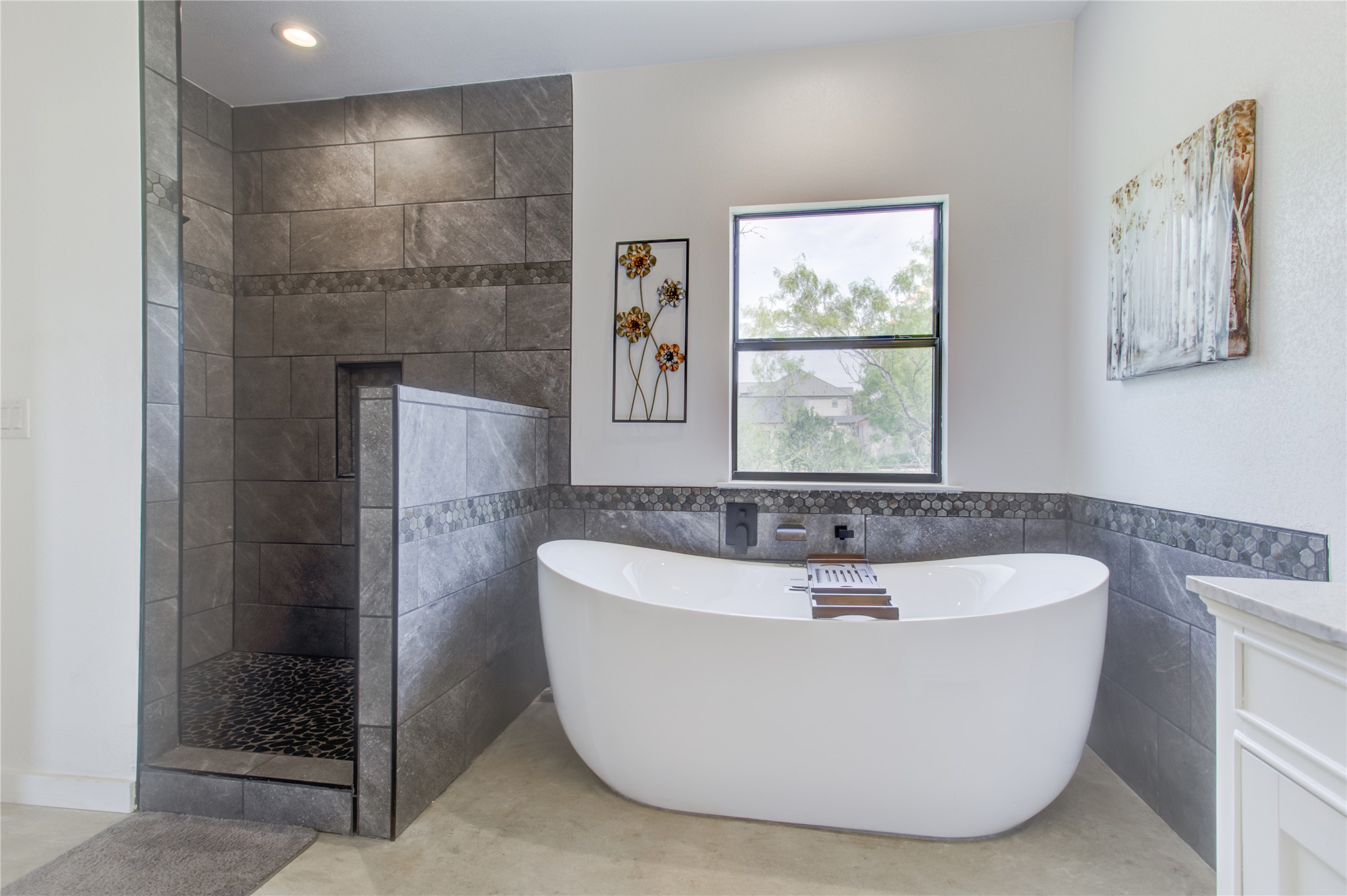 1215 Ridge Harbor Drive Spicewood, TX 78669 - Photo 20 of 39 a white bath tub sitting in a bathroom