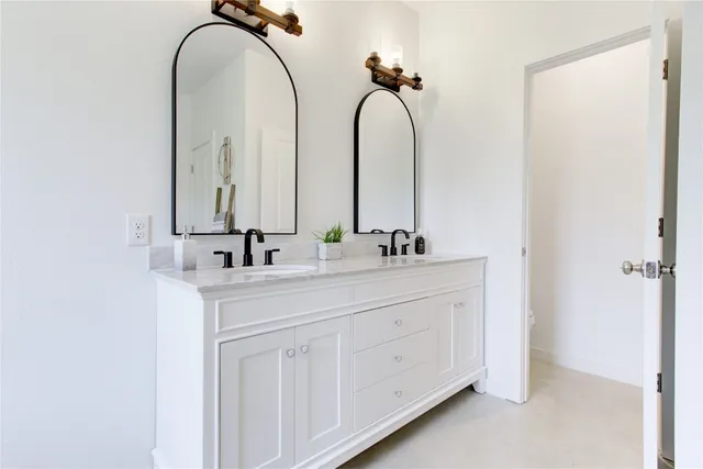 a white bath tub sitting in a bathroom