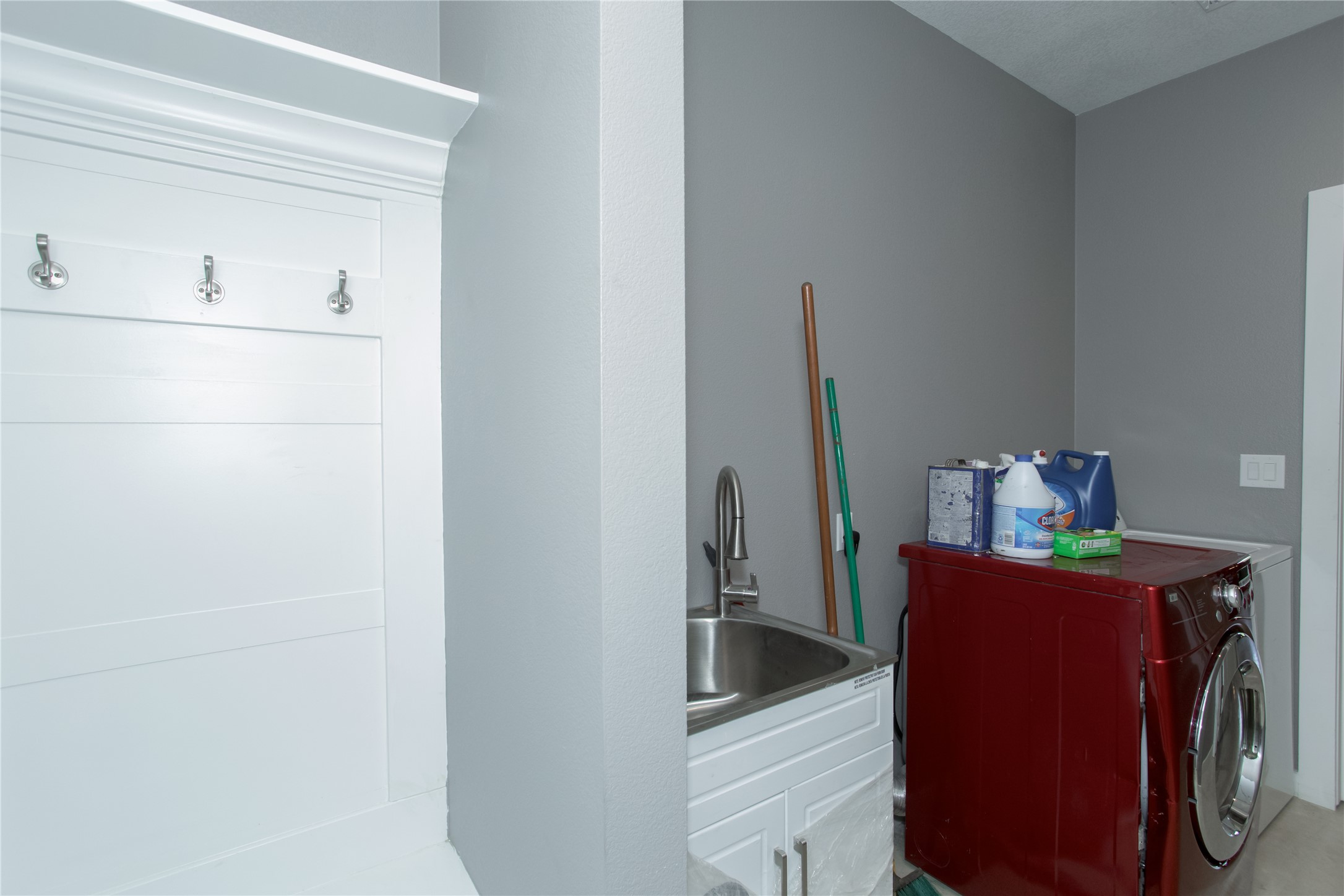 1215 Ridge Harbor Drive Spicewood, TX 78669 - Photo 25 of 39 a utility room with dryer and washer